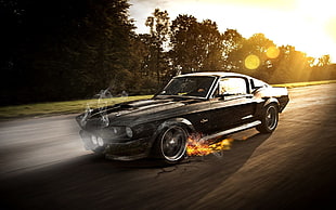 black Ford Mustang on road
