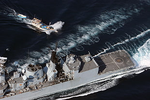 warship on sea at daytime