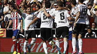 men's white shirt and black shorts, soccer, valencia, men, sport 