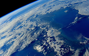 photo of earth from outer space HD wallpaper