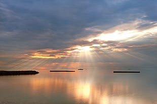 sunrise photography of calm ocean