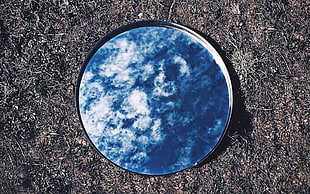 round silver framed mirror, mirror, ground, sky, reflection