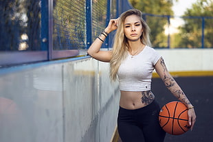 woman holding basketball