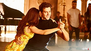 photo of man and woman dancing HD wallpaper