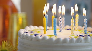 lighted candles on cake
