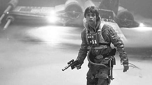 photo of man holding pistol Star Wars digital wallpaper