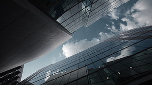 low angle photography of curtain wall building, building, reflection, clouds, worm's eye view