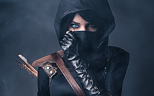 female character wearing black mask