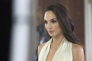selective focus photography of Gal Gadot wearing beige top