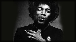 portrait of Jimi Hendrix holding cigarette