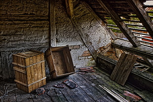 two brown wood  crates on attic