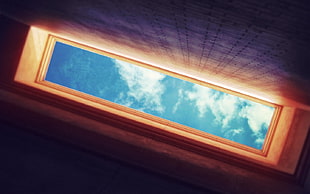 low angle photography of cloudy skies