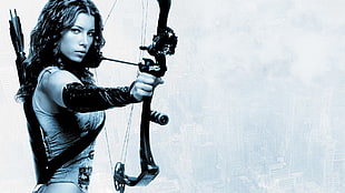 woman with compound bow digital wallpaper