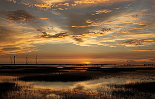 panorama view of landscape of body of water during dusk HD wallpaper