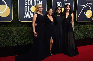women's four black dresses