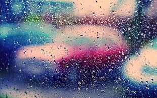 macro shot of water droplets on glass