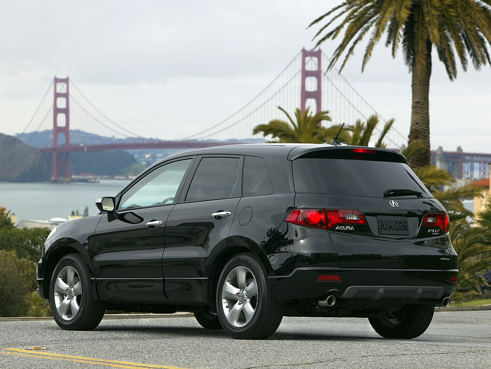black SUV park near Golden Gate Bridge HD wallpaper