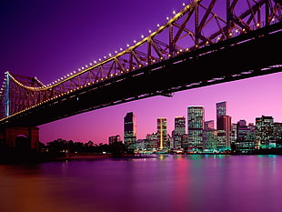 bridge beside city during dawn landscape photography HD wallpaper
