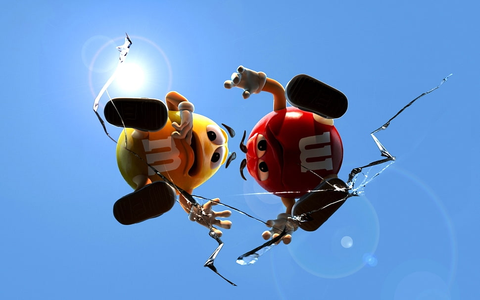 red and yellow M&M standing on clear broken glass HD wallpaper