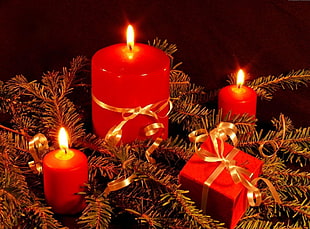 three red pillar candles