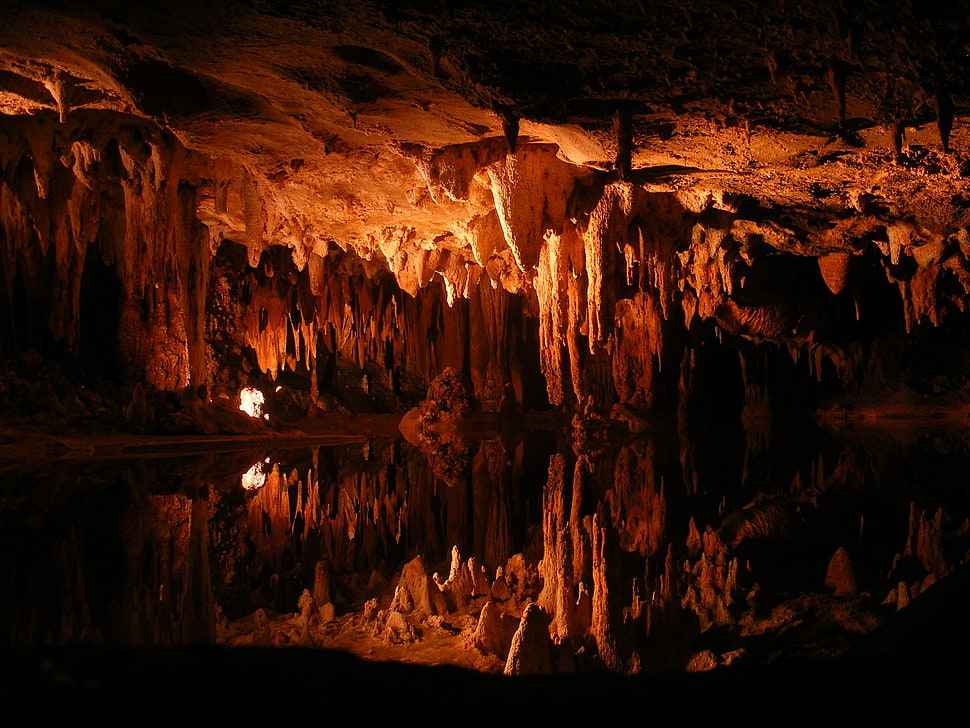 brown stalagmites and stalactites, cave, water HD wallpaper
