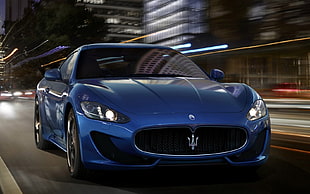 time lapse photography of blue Maserati GranTurismo coupe