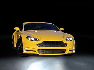 yellow Aston Martin V12