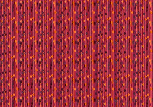 closeup photo of red and orange textile