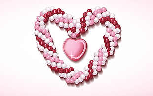 pink and white beaded heart shaped necklace