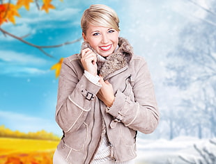 woman wearing gray wool coat with winter background