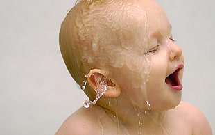 baby while bathing photo