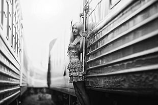 woman leaning on train