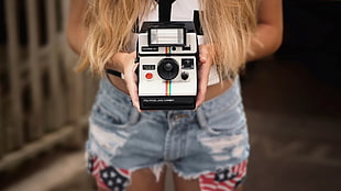 black and white Fujifilm instant camera, polaroids
