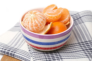 bowl of ripped oranges
