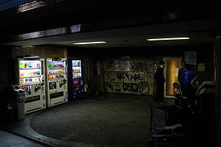white vending machine, garages, graffiti