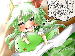 school girl holding green monster artwork