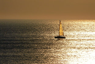 photography of sailing boat on ocean HD wallpaper