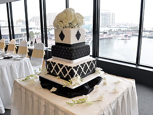 three layered black and white cake