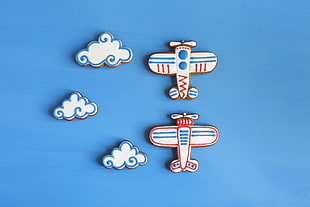 white-red-and-blue biplane stickers, cookies, food, blue, icing
