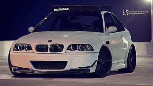 white BMW E46 M3 coupe on black top road HD wallpaper