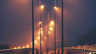 black post, lights, street, utility pole, bridge