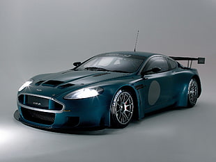 teal Aston Martin coupe