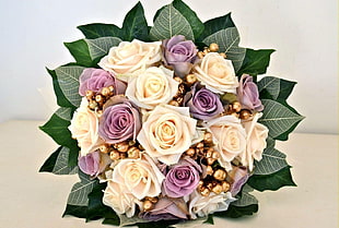 beige and purple rose bouquet