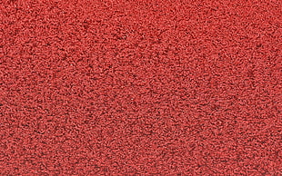close up photo of red suede textile