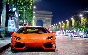 orange Lamborghini sprors vehicle, supercars, Lamborghini, rain, Arc de Triomphe HD wallpaper