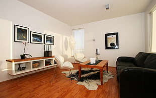 white, brown, and black living room interior