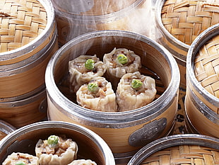 depth of field photo of four steamed siomai