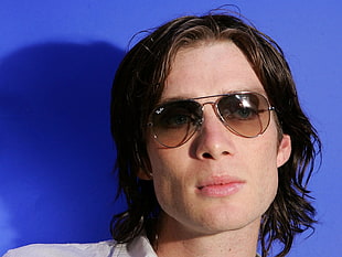 close view of man wearing Ray-Ban aviator sunglasses