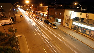 time lapse photography of road near building