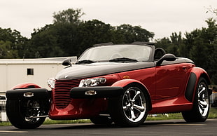 red and black convertible coupe